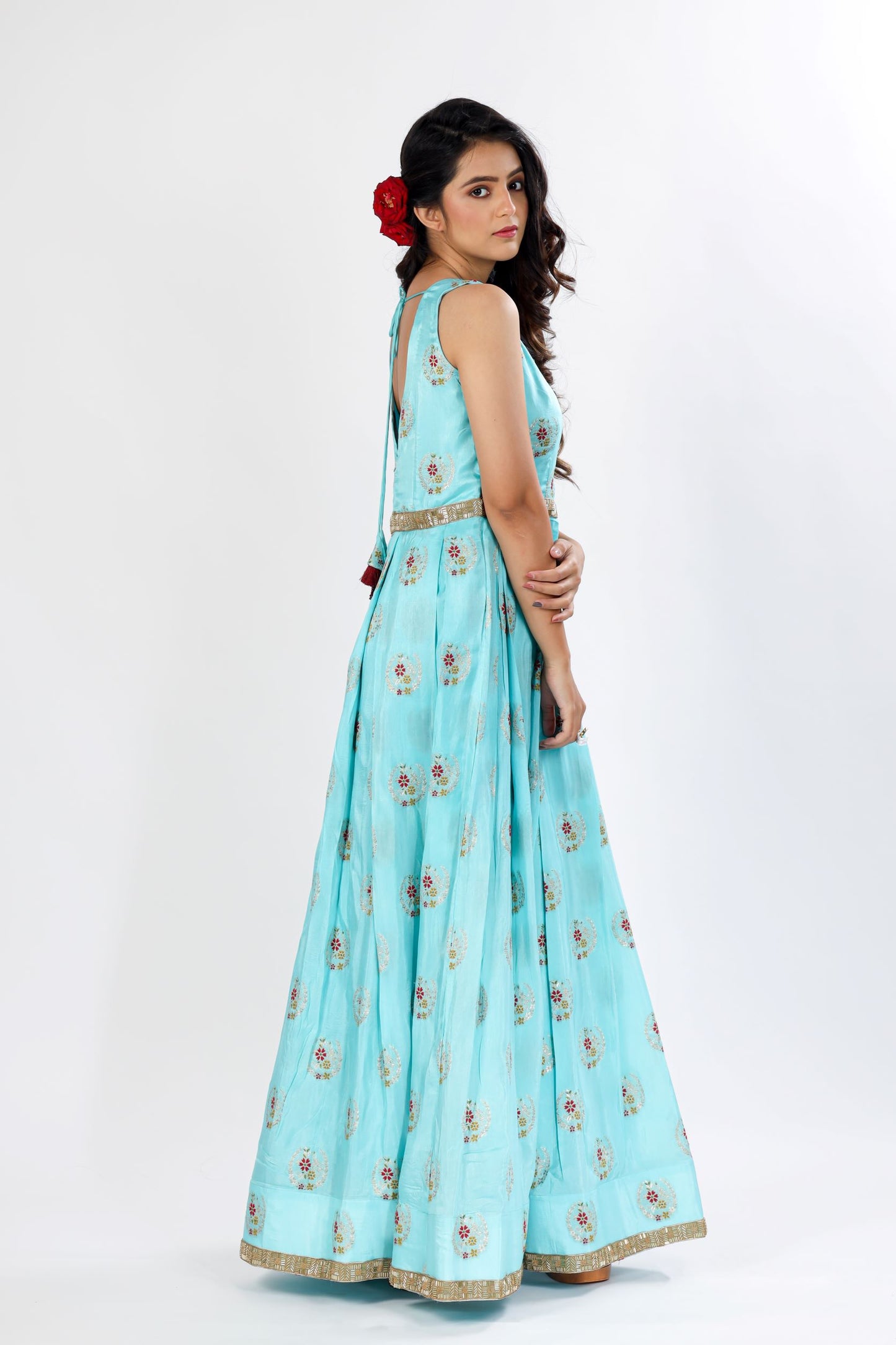 KUSH - A self-brocade gown with exquisite detailing on hem