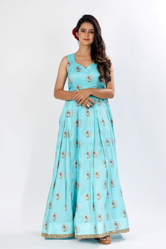 KUSH - A self-brocade gown with exquisite detailing on hem