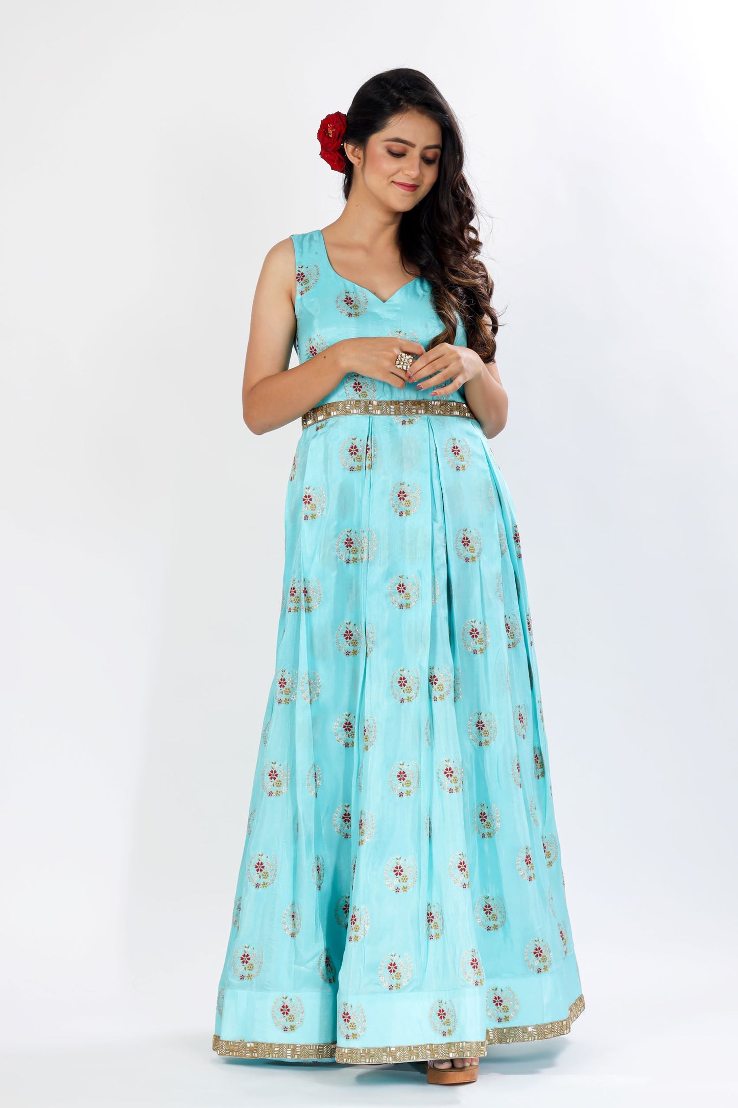 KUSH - A self-brocade gown with exquisite detailing on hem