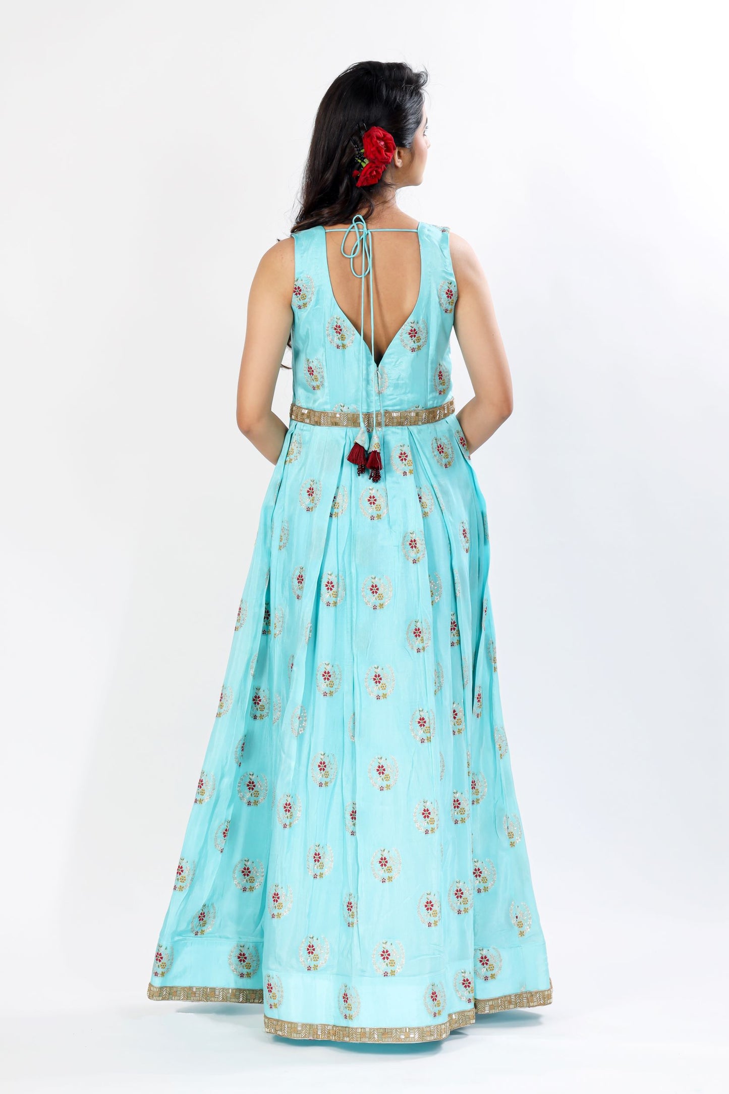 KUSH - A self-brocade gown with exquisite detailing on hem