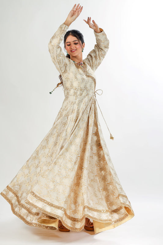 MEKSHA - Ivory and gold Angrakha Kurta gown with attached tassels