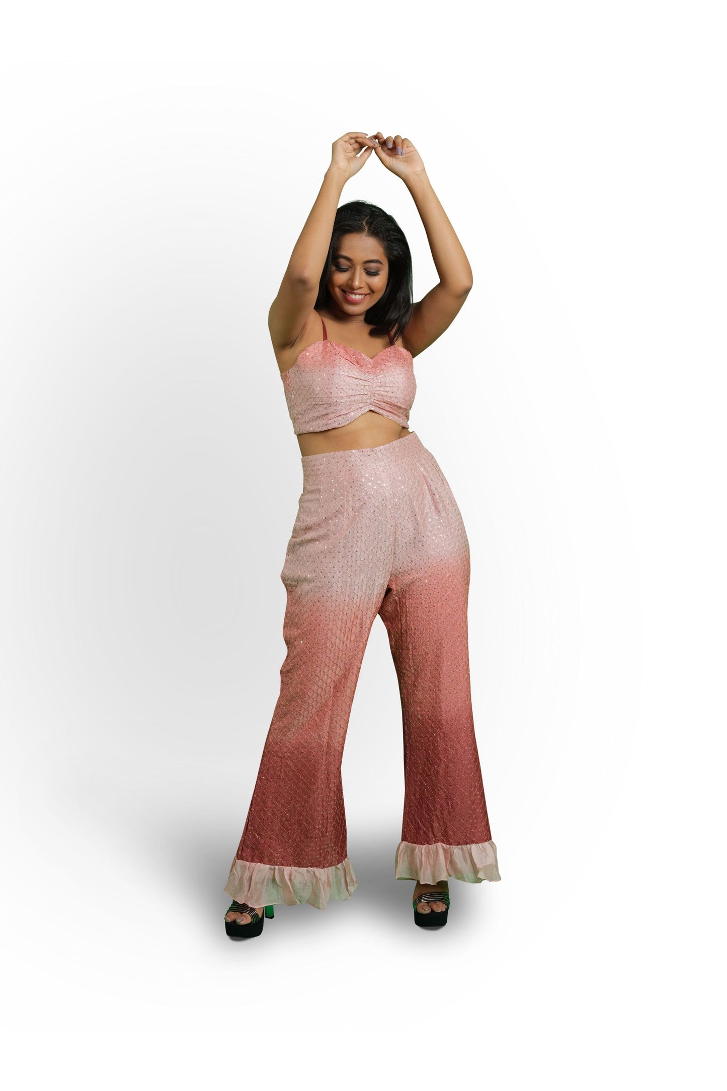 SAAVNI - A bustier top with frilled high waist pants